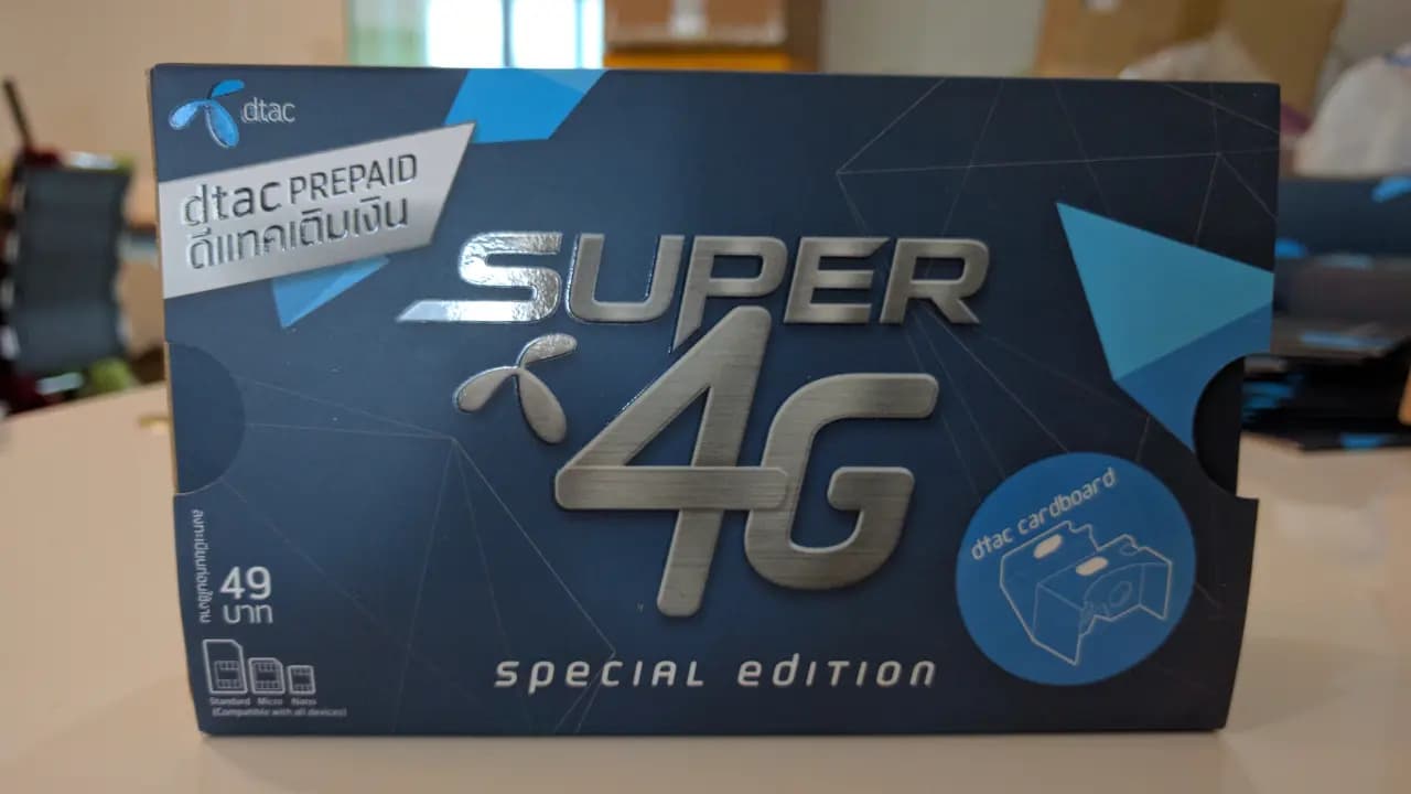 A Super 4G Special Edition box rests on a table, showcasing a custom-themed cover for a cardboard VR headset.