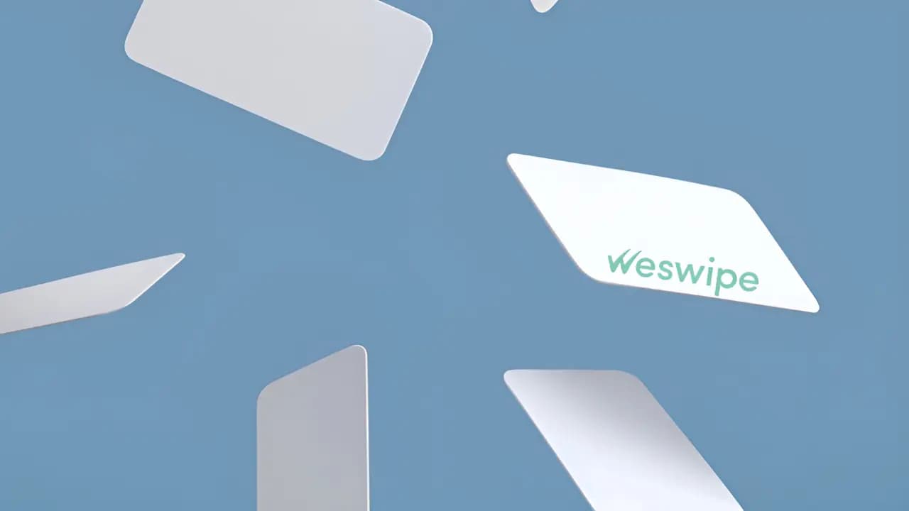 Illustration of a white blank card on a blue background, one card featuring the Weswipe logo.